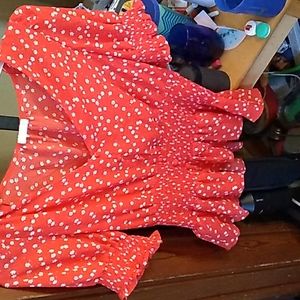 A large red flower shirt